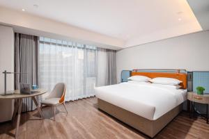 Foto Wenshanis asuva majutusasutuse Echarm Hotel Wenshan galeriist