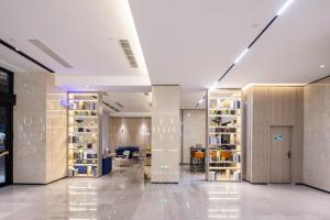 Foto Wenshanis asuva majutusasutuse Echarm Hotel Wenshan galeriist