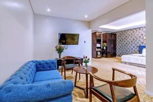 Μια τηλεόραση ή/και κέντρο ψυχαγωγίας στο Thu Trang Hotel VT - by BAY LUXURY