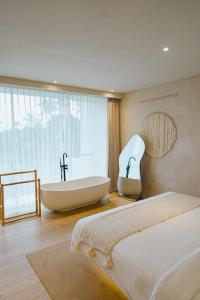 Ένα ή περισσότερα κρεβάτια σε δωμάτιο στο New Bubble Villa