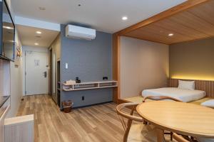 TV a/nebo společenská místnost v ubytování Kansai International Airport Hotel 11