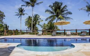 Πισίνα στο ή κοντά στο Pousada Villa das Palmeiras