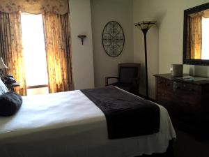 Letto o letti in una camera di Boulder Dam Hotel