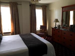 Letto o letti in una camera di Boulder Dam Hotel