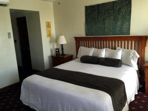 Letto o letti in una camera di Boulder Dam Hotel