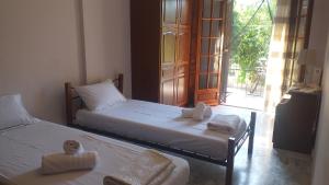 Giường trong phòng chung tại Sea House
