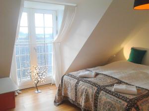 Postel nebo postele na pokoji v ubytování Roskilde B&B