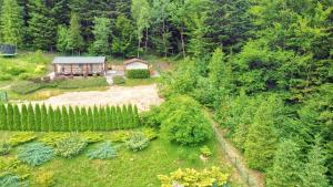 an overhead view of a house in a garden at Śniegocinka 2 in Brenna +5 photos