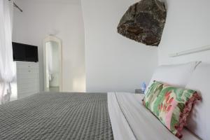 Postel nebo postele na pokoji v ubytování Thirea Studios + 31 fotografií