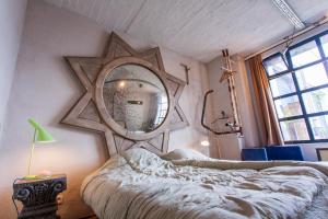Postel nebo postele na pokoji v ubytování Loft by Conceptliving