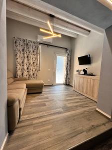 TV a/nebo společenská místnost v ubytování Agriturismo B&B La Cerasa