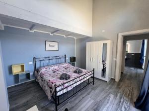 Postel nebo postele na pokoji v ubytování Agriturismo B&B La Cerasa
