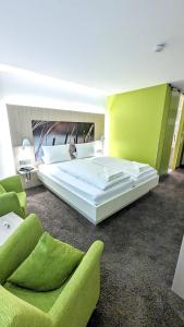 Postel nebo postele na pokoji v ubytování Hotel Gierer