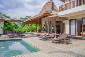 een afbeelding van een villa met zwembad bij Villa Lumia Bali in Ubud