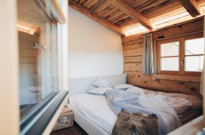 Posteľ alebo postele v izbe v ubytovaní L.A. MOUNTAIN LODGE