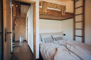 Posteľ alebo postele v izbe v ubytovaní L.A. MOUNTAIN LODGE