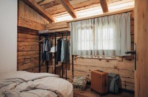Posteľ alebo postele v izbe v ubytovaní L.A. MOUNTAIN LODGE