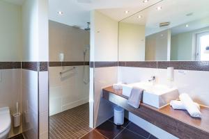 Koupelna v ubytování Hotel Gierer