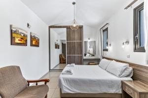 Postel nebo postele na pokoji v ubytování Platzia Beach Villas