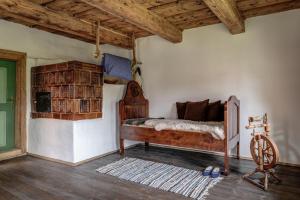 Postel nebo postele na pokoji v ubytování chalupa Hajan