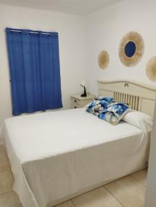 Ένα ή περισσότερα κρεβάτια σε δωμάτιο στο Anamar Torrox