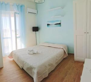 Postel nebo postele na pokoji v ubytování Casa La Fenice Favignana