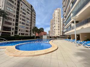 Bazén v ubytovaní Ático Bahía del Sol en Calpe con impresionantes vistas - Inmodream Calpe alebo v jeho blízkosti
