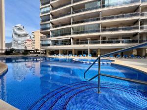 Bazén v ubytovaní Ático Bahía del Sol en Calpe con impresionantes vistas - Inmodream Calpe alebo v jeho blízkosti