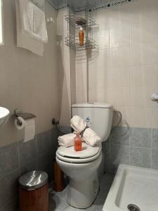 a bathroom with a white toilet and a sink at Home for you Halkidiki in Kallithea Halkidikis +15 photos