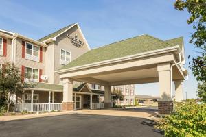 una representación de la parte delantera de un hotel en Country Inn & Suites by Radisson, Peoria North, IL, en Peoria