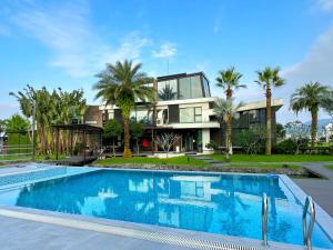 Bazén v ubytování Aqua Star Villa Homestay nebo v jeho okolí