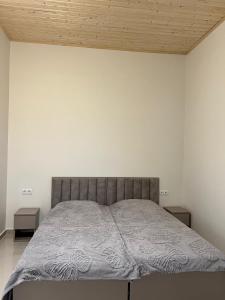 Postel nebo postele na pokoji v ubytování Гостевой дом Руслан