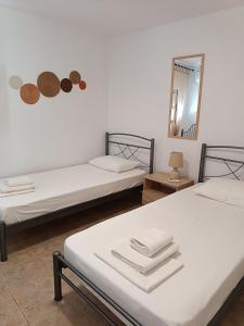 A bed or beds in a room at Evi's home