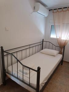 A bed or beds in a room at Evi's home