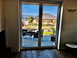 Μπαλκόνι ή βεράντα στο Ferienwohnung in Heiligenhafen Ostsee mit Meerblick