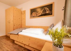 Letto o letti in una camera di AURA Bed & Breakfast