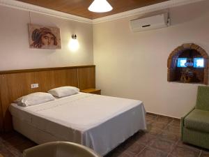 Кровать или кровати в номере Medusa House Butik Hotel