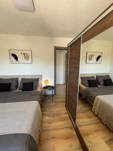 Postel nebo postele na pokoji v ubytování Villa Branko
