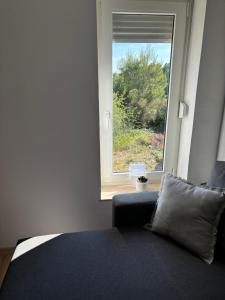 Postel nebo postele na pokoji v ubytování Villa Branko