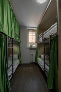 Postel nebo postele na pokoji v ubytování Happy Street Hostel