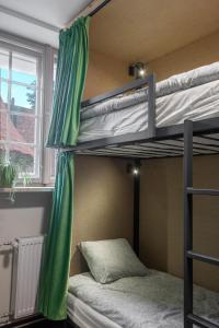 Postel nebo postele na pokoji v ubytování Happy Street Hostel