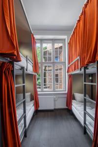 Postel nebo postele na pokoji v ubytování Happy Street Hostel