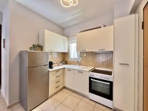 ネア・ミカニオーナにあるP Deluxe Suites B3のギャラリーの写真 +12枚の写真