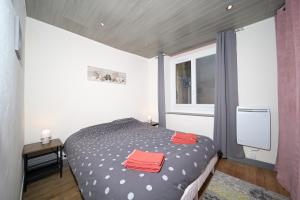 Postel nebo postele na pokoji v ubytování Le Gîte des 3000 avec Spa