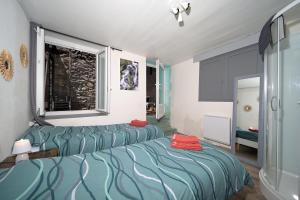 Postel nebo postele na pokoji v ubytování Le Gîte des 3000 avec Spa