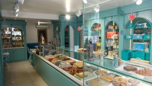 a bakery filled with lots of different types of pastries at Galata Moon Hotel in Istanbul