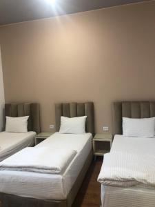 Letto o letti in una camera di Wald Hotel Lagodekhi