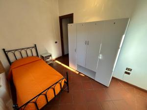 Ένα ή περισσότερα κρεβάτια σε δωμάτιο στο La Casa del Borgo +34 φωτογραφίες
