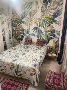 En eller flere senge i et værelse på Apartamento Arte Malaga