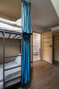 Postel nebo postele na pokoji v ubytování Happy Street Hostel